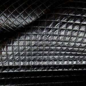 doorgestikte zwarte lak